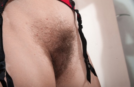 Thin amateur Alecia Fox tugs on hairy pussy lips after displaying hairy pits