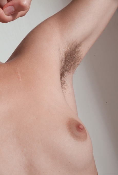 Thin amateur Alecia Fox tugs on hairy pussy lips after displaying hairy pits