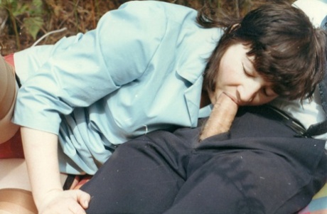 Mature dark haired model sucking and getting banged outdoors in vintage porno