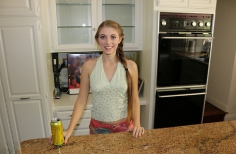 First timer Alyce Anderson gets naked on kitchen counter to part her pussy