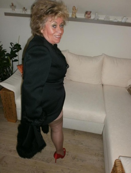 Crazy mature woman Caro takes her panties off and spreads her hairy coochie