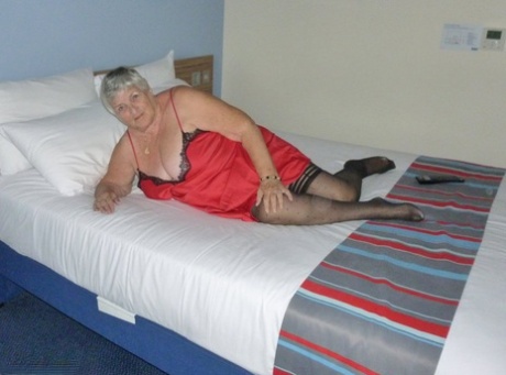 Fat man Grandma Libby doffs her lingerie before masturbating on her bed