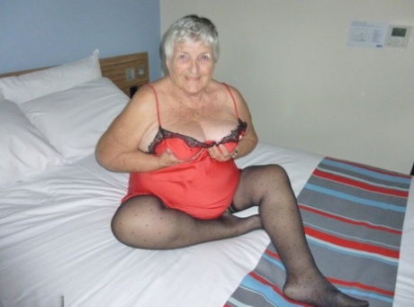 Fat man Grandma Libby doffs her lingerie before masturbating on her bed