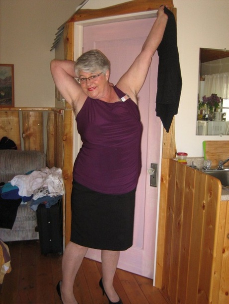 Fat granny Girdle Goddess exposes her pussy in crotchless panties and a girdle