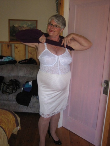 Fat granny Girdle Goddess exposes her pussy in crotchless panties and a girdle