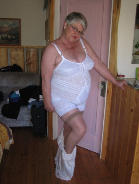 Fat granny Girdle Goddess exposes her pussy in crotchless panties and a girdle