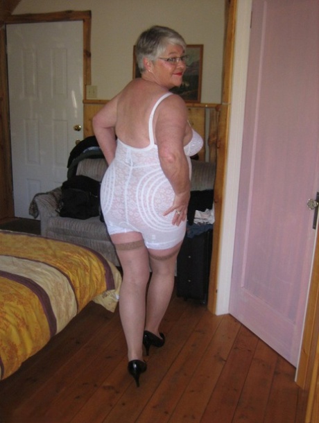 Fat granny Girdle Goddess exposes her pussy in crotchless panties and a girdle