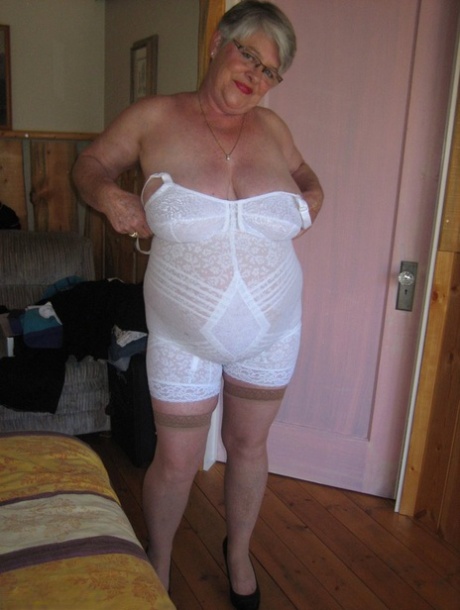 Fat granny Girdle Goddess exposes her pussy in crotchless panties and a girdle