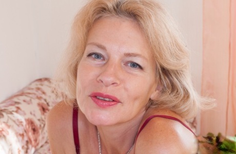 Mature lady Diana Douglas parts her hairy bush in her nude modeling debut