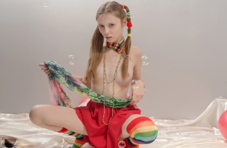 Sweet young Catalina in pigtails spreading wide to bare her tiny teen pussy