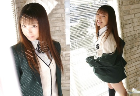 Cute asian schoolgirl Emiru Momose revealing her tiny tits and shaggy cooter