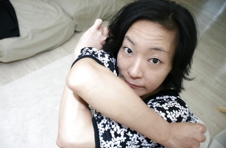 Naughty asian MILF Aya Sakuma undressing and exposing her holes