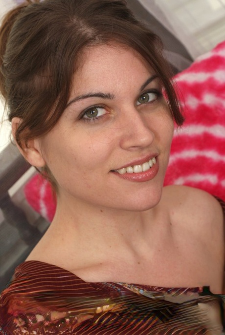 Beautiful amateur babe Holly takes her clothes off & flaunts her furry pussy