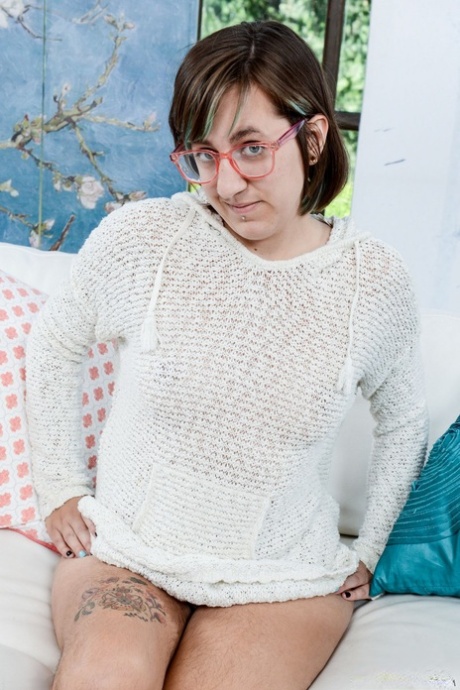 Brunette girl in glasses Anika Darling reveals her hairy muff and asshole