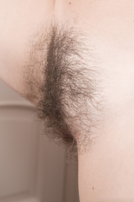 Russian with natural tits Kira Tomson gives up skirt flash & shows hairy cunt