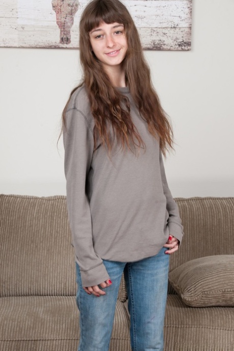 Slender teen Willow takes off her jeans, shows her small tits and furry vagina