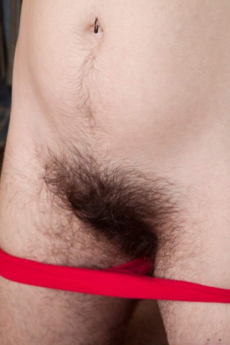 Super hairy teen Harley stripping naked and masturbating on the carpet