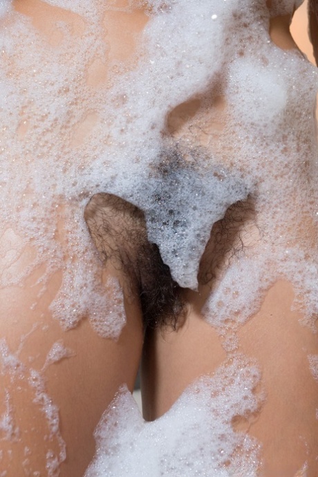 Black haired beauties Sally & Virgin fingering hairy pussy kissing in the bath