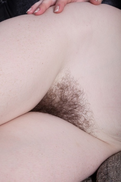 Teen redhead with massive juggs Elouisa shows off her hairy vagina and asshole