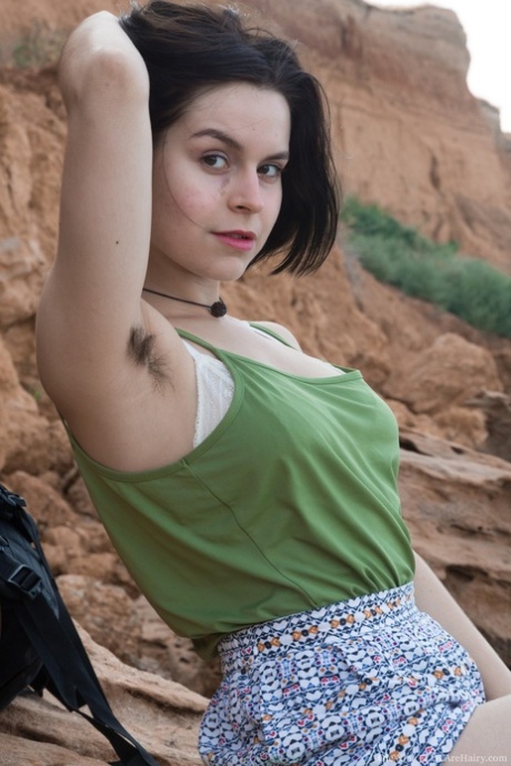 Cute Ukrainian chick Ole Nina strips naked outdoors and shows her muff