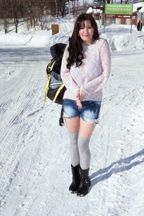 Brunette hitchhiker Vanessa Y exposes her hooters and bush for a ride