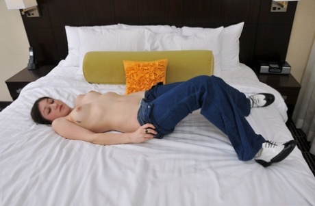 Petite sweetie Wendy doffs denim jeans to display her petite hairy beaver