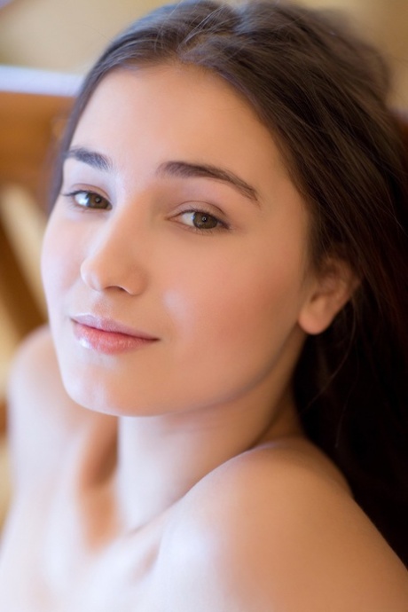 Adorable teen with cute boobs Francine A hikes her red dress up and poses