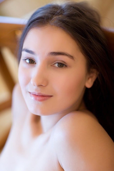 Adorable teen with cute boobs Francine A hikes her red dress up and poses