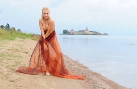 Glamorous teen Berry A showing her perfectly shaped tits & bush on the beach