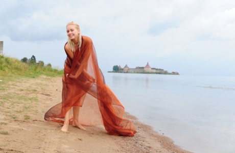 Glamorous teen Berry A showing her perfectly shaped tits & bush on the beach