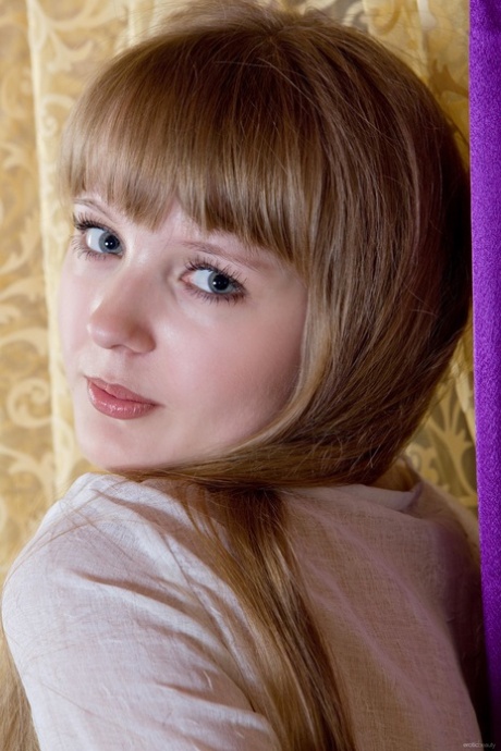 Gorgeous teen Wendy B posing and showing her furry pussy in a solo