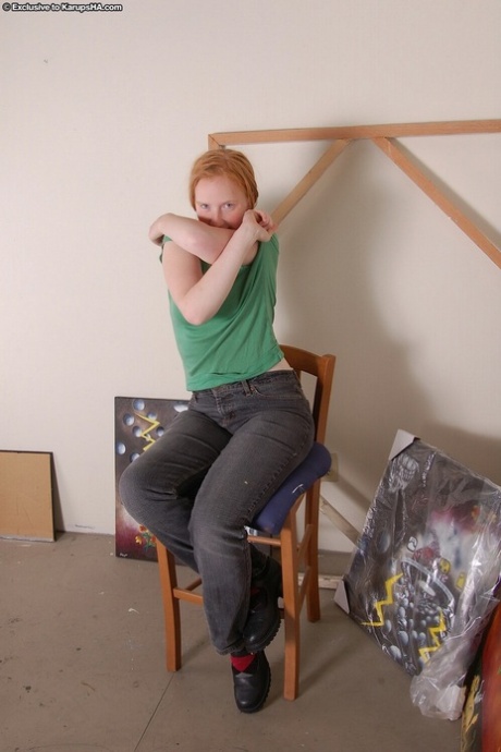 Amateur teen Claire strips and reveals her curvy body and furry pussy
