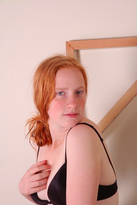 Amateur teen Claire strips and reveals her curvy body and furry pussy