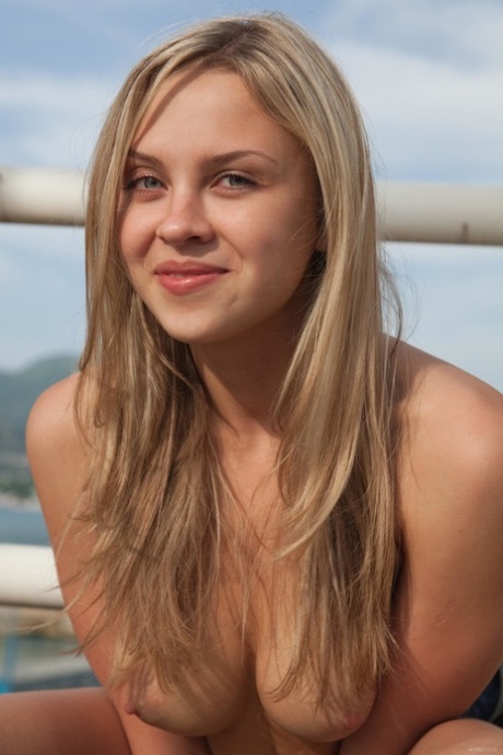 Blonde babe with beautiful eyes Luciana A flaunts her amazing figure