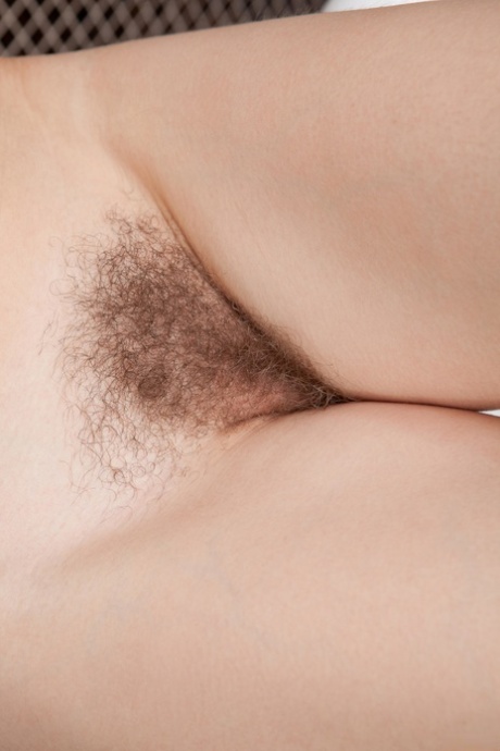Glamorous redhead Orabelle Koivu shows off her hairy pussy in the bathroom