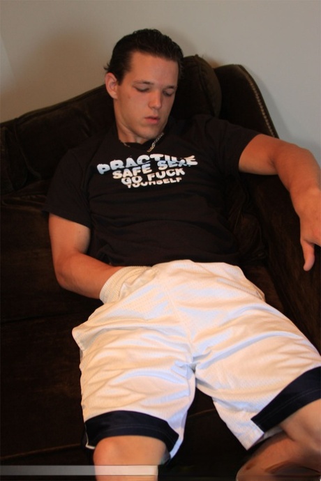 Hot gay Lee Stephens pulls out his his dick and strokes it in solo action