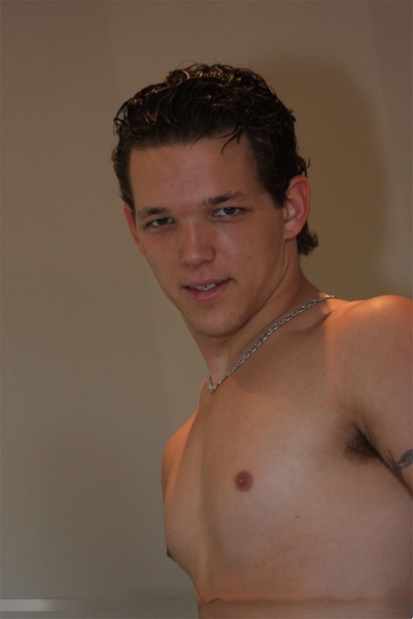 Hot gay Lee Stephens pulls out his his dick and strokes it in solo action
