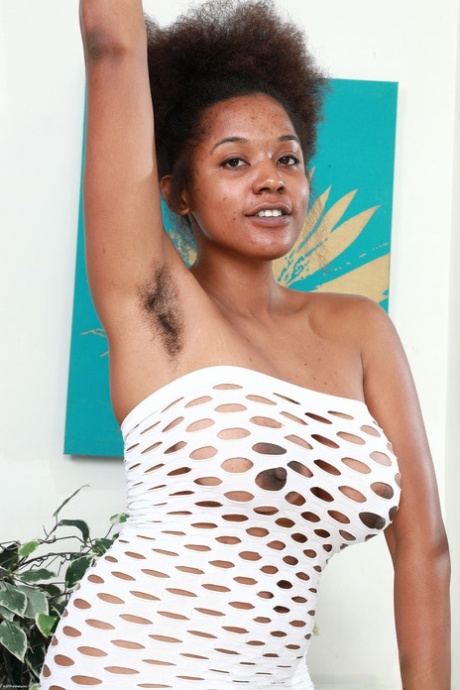 Curvaceous ebony Panreece spreads her very hairy pussy up close