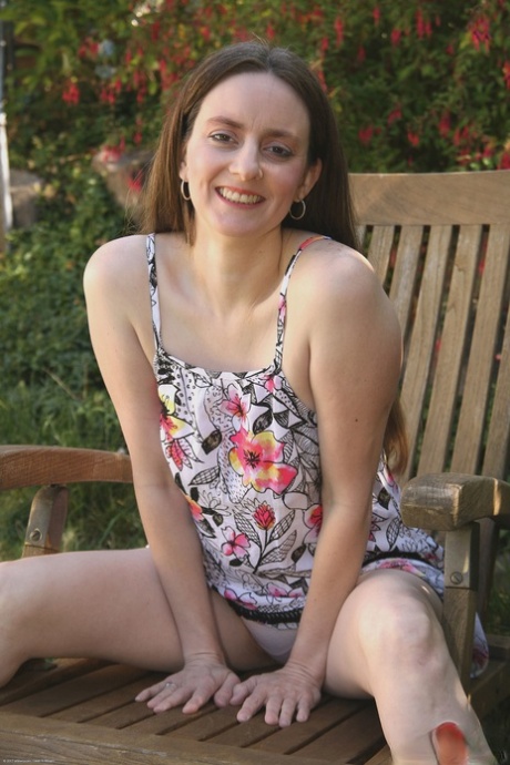 Curvy amateur Trixie shows off her big ass & spreads her hairy cunt outdoors