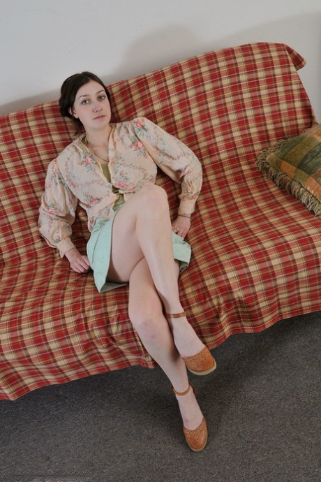Brunette teen Wendy spreads & fingers her hairy pussy in the living room