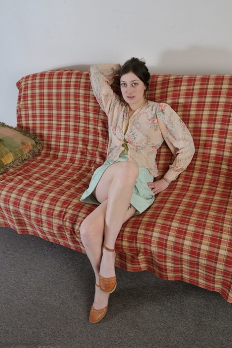 Brunette teen Wendy spreads & fingers her hairy pussy in the living room
