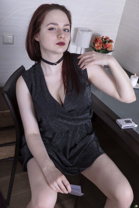 Hot ginger Laurel Lagne undresses and exposes her big boobs and furry coochie