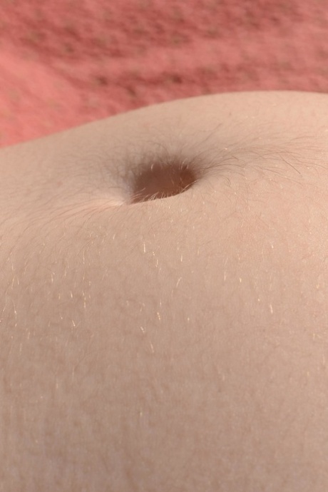 Redhead with big boobs Eleanor Rose displays her very hairy pussy up close