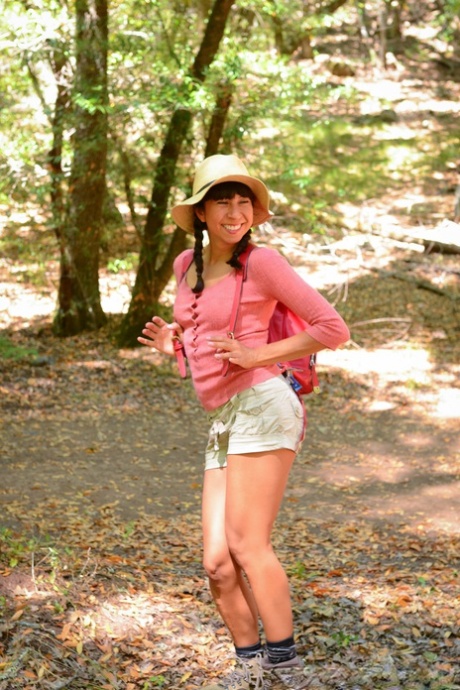Latina Vivi Marie strips and shows her hairy cunt while camping in the woods
