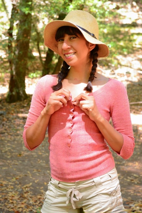Latina Vivi Marie strips and shows her hairy cunt while camping in the woods