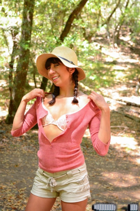 Latina Vivi Marie strips and shows her hairy cunt while camping in the woods