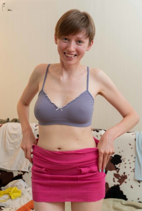 Short haired amateur Erina flaunts her skinny legs and nice natural tits