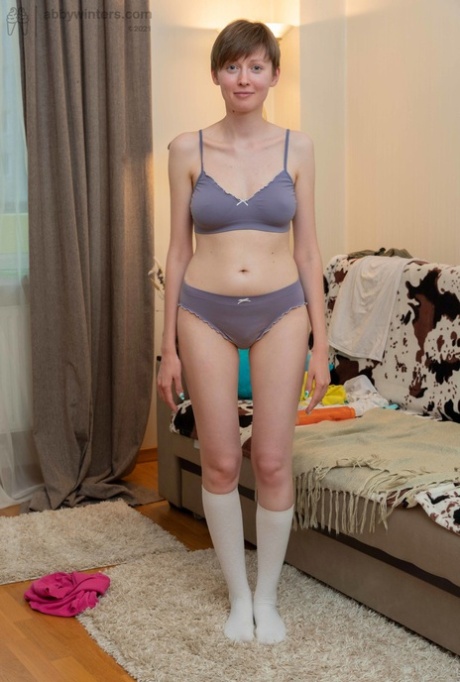 Short haired amateur Erina flaunts her skinny legs and nice natural tits