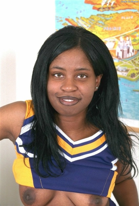 Black amateur cheerleader Holly flaunts her big tits and big ass in a solo