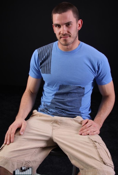 Dark-haired gay model Vander unveils his big hairy dick as he strips